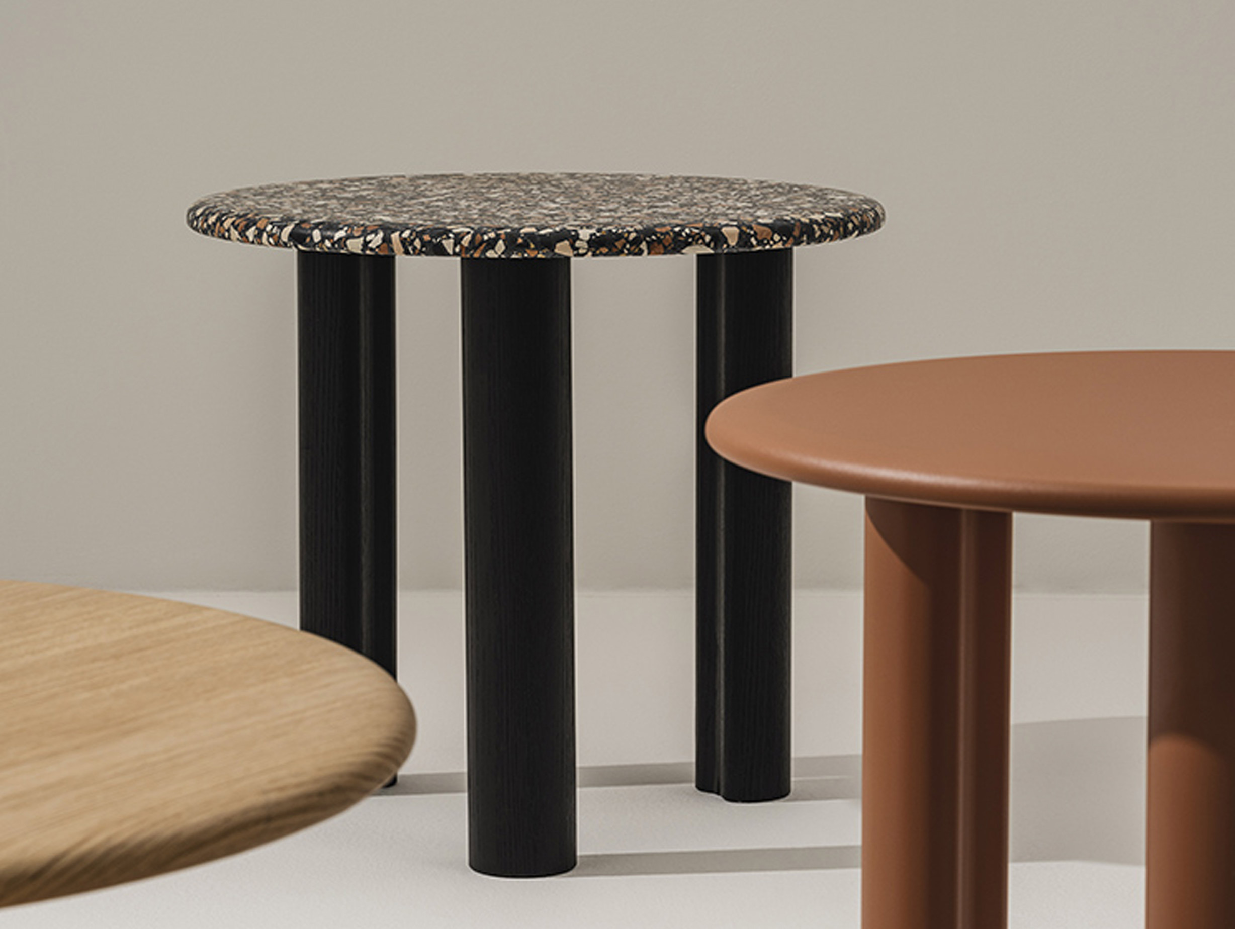 Arper ghia three legged base table lifestyle