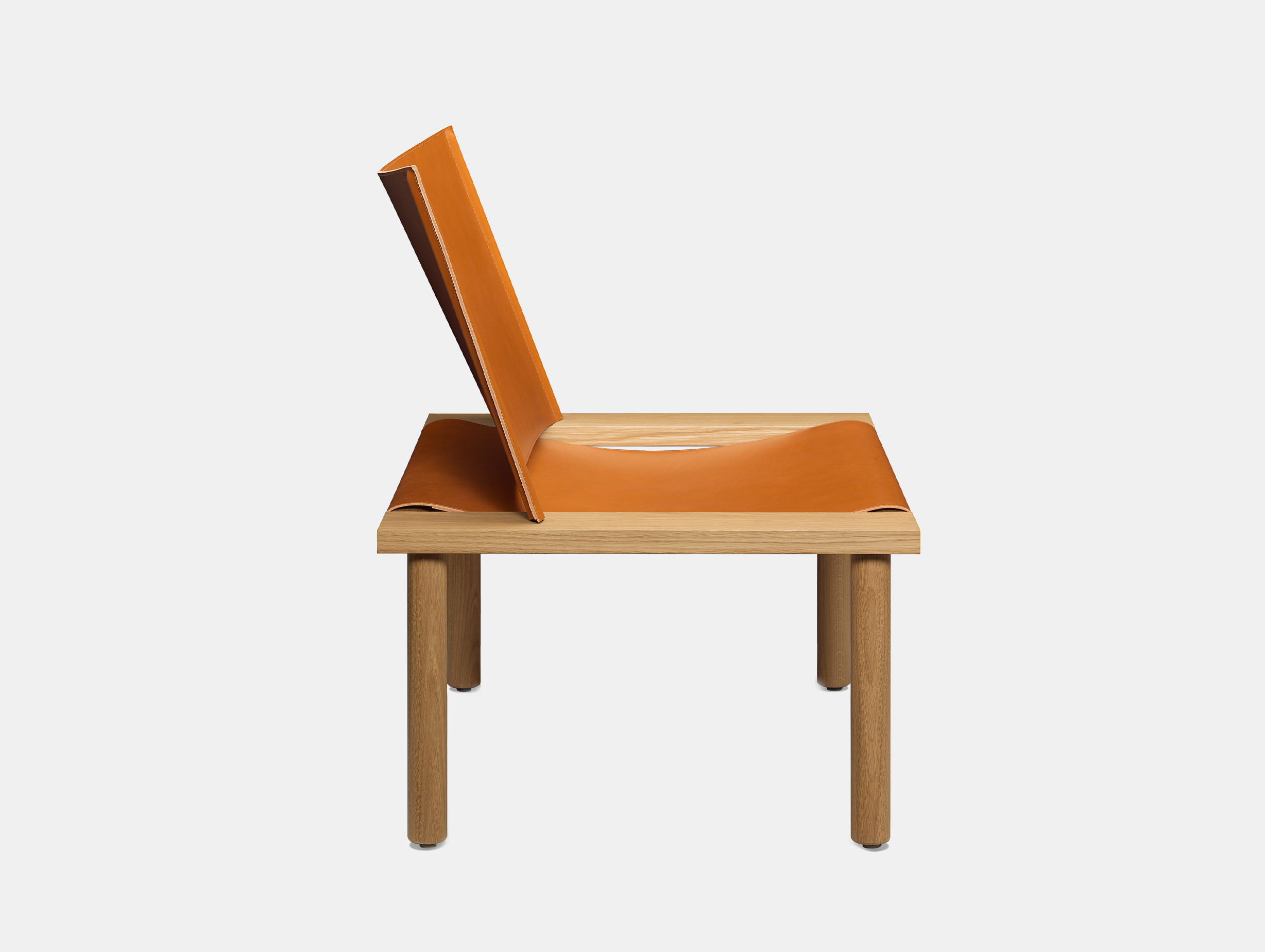 E15 ilma lounge chair brandy leather oak side